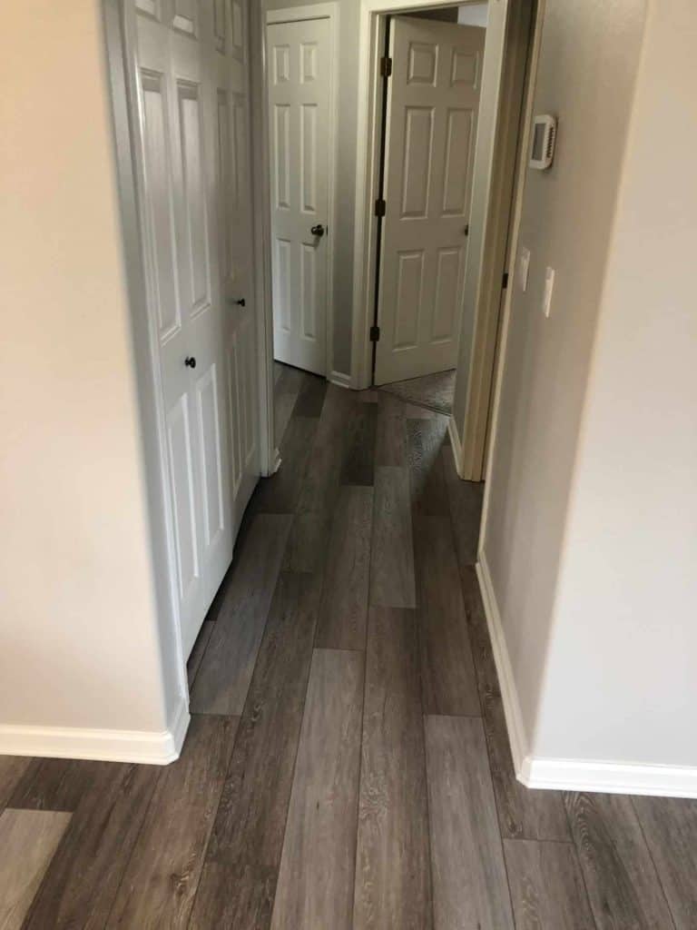 The new laminate flooring extends throughout the main areas of the home.