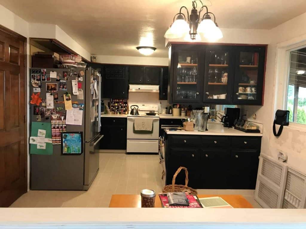 After living with this kitchen for 13 years, the family was ready for a drastic change. The overall goal was to utilize the entire room as kitchen space and to provide a crisp and clean appearance.