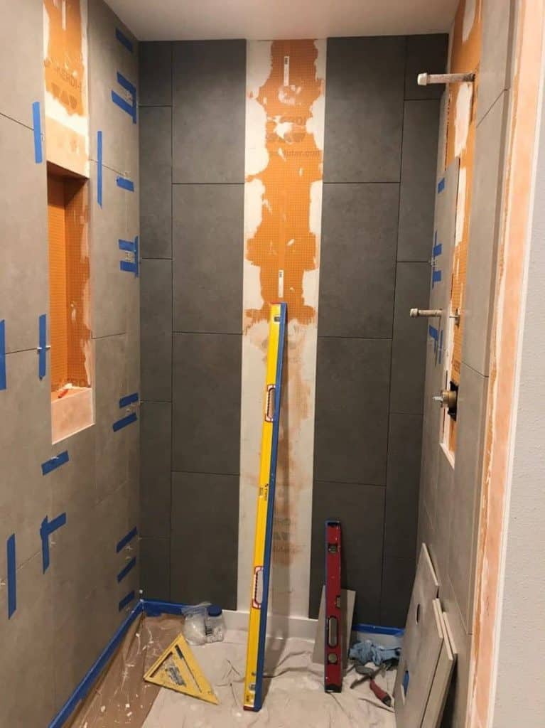 The tile is going up...