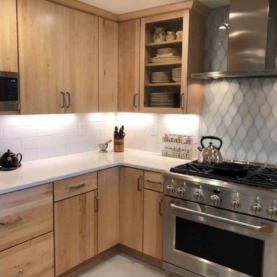 AFTER By eliminating the countertop microwave, the homeowner can utilize precious work space. Mounted beneath an upper cabinet, the “space-saver” microwave is a great solution for this kitchen.