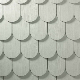 PRODUCT OPTION<br />
HARDIESHINGLE® SIDING. HALF-ROUNDS Clad in scalloped-edge shingles, vacation homes and everyday abodes look equally quaint.