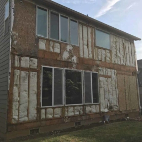 DURING The original siding and windows were not installed properly and there was water penetrating through to the sheathing in multiple areas. As a result, there were dry rot issues that needed to be addressed.