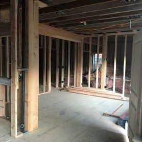 DURING This view is from the new dining area looking into the living room and (to the left) will be part of the new kitchen.