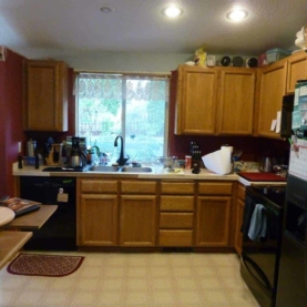 BEFORE The partial walls and full walls that made the kitchen a separate room had to come down to create an open feeling.